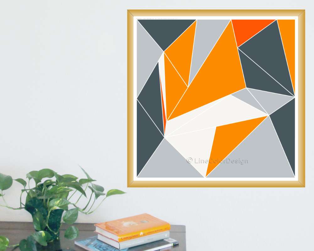 framed art print showing orange, grey and black triangles in geometric pattern