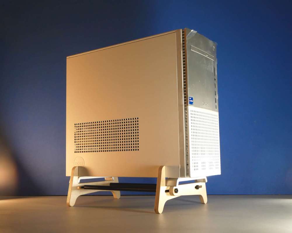 a mid century modern wood stand supporting a PC computer tower