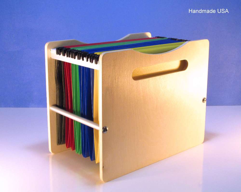 a small tabletop modern box holding hanging folders.  Made from Baltic birch wood and aluminum